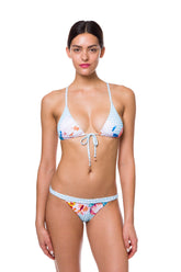 Model wearing Montauk Bikini Top with front tie and removable cups, made in Italian fabric for poolside and beach bar wear