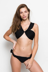 Model wearing Mermaid Ruffle Bikini Bottom with flirty ruffle detail and moderate coverage — made in eco-friendly Italian swim fabric