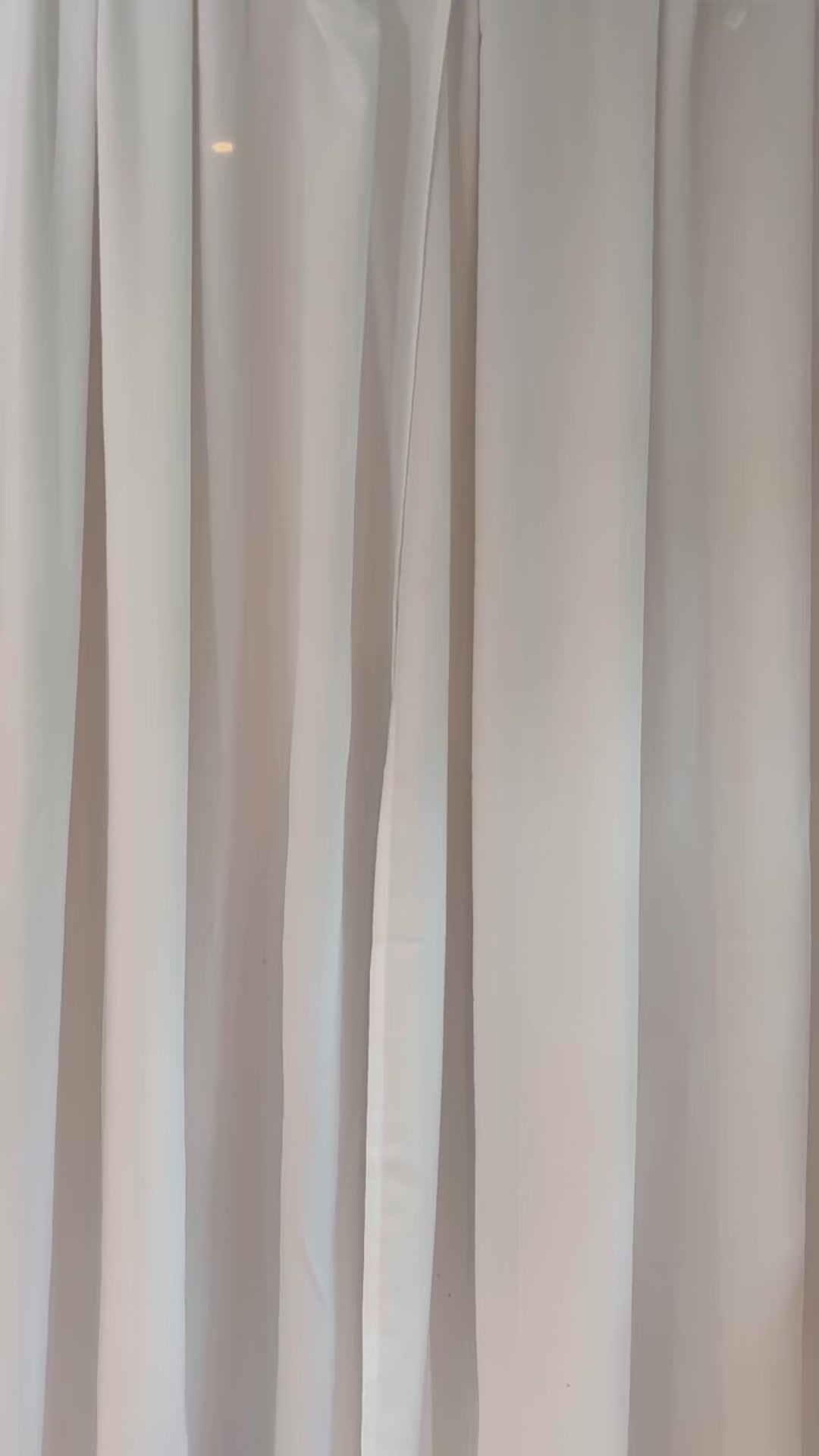 Model wearing Montauk Bikini Top with front tie and removable cups, made in Italian fabric for poolside and beach bar wear